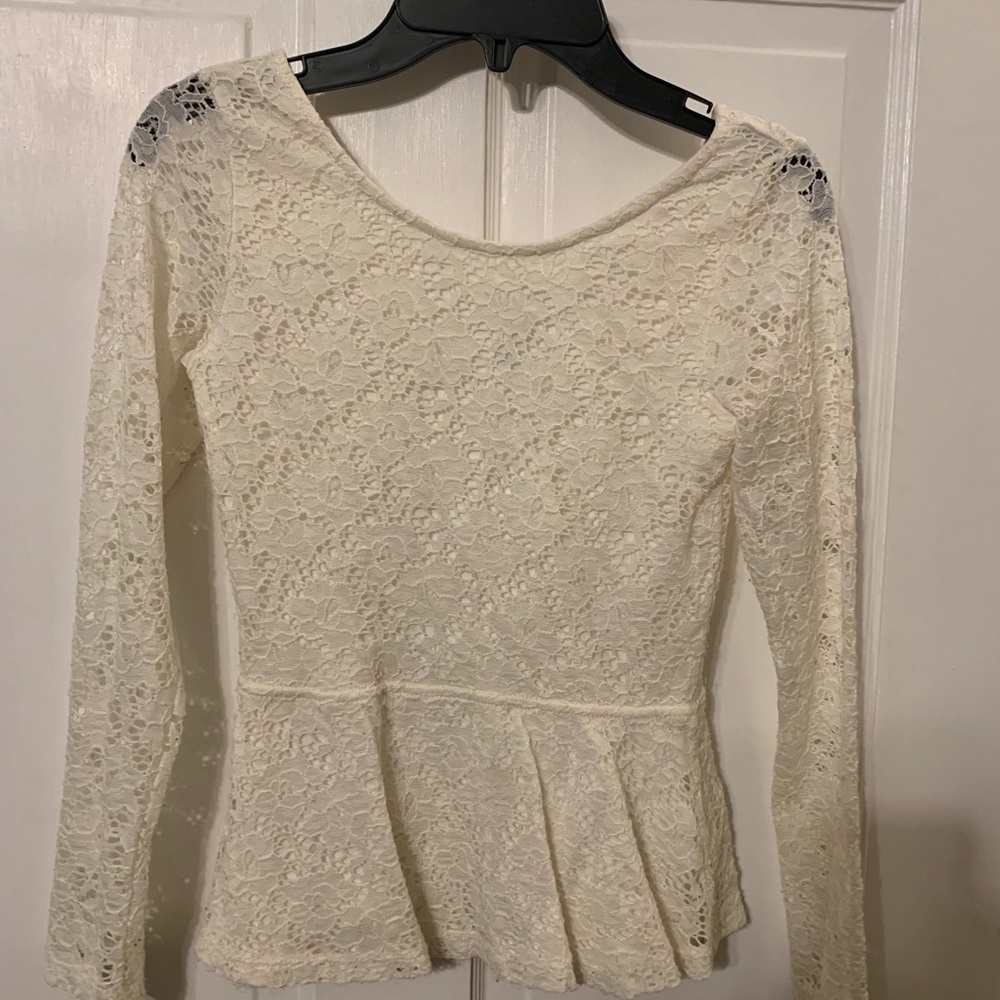 Girls lace peplum shirt. Size 8 to 10.